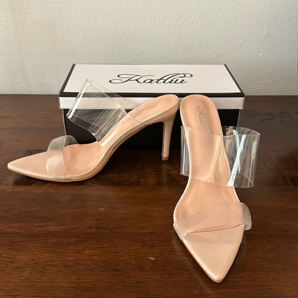 Brand new never worn clear pointed toe pumps